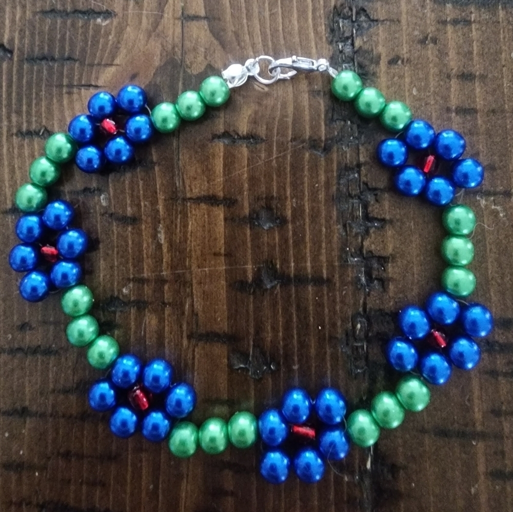 Vibrant Blue and Green Beaded Bracelet with Twisted Design